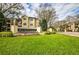 Elegant community entrance with manicured lawn and signage for The Madison at MetroWest at 2624 Robert Trent Jones Dr # 633, Orlando, FL 32835