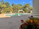 Community pool provides a refreshing oasis for relaxation and recreation at 2624 Robert Trent Jones Dr # 633, Orlando, FL 32835