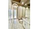 Well-lit bathroom features neutral paint, tile flooring, a modern sink, and access to the shower at 307 Running Wind Ln, Maitland, FL 32751