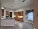 Well-equipped kitchen featuring custom cabinets, built-in appliances, and a central island and eating area at 307 Running Wind Ln, Maitland, FL 32751