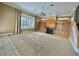Cozy living room featuring a fireplace, built-in shelving, and large windows for ample natural light at 307 Running Wind Ln, Maitland, FL 32751