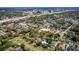 Stunning aerial view of a home with golf course frontage and a beautiful neighborhood setting at 3519 Backspin Ln, Orlando, FL 32804