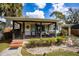 Inviting covered front porch with comfortable seating and stylish accents at 3519 Backspin Ln, Orlando, FL 32804