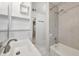 Bathroom with a tub and shower, vanity sink, and white tiled floor at 4249 Kendrick Rd, Orlando, FL 32804