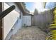 The side yard features a privacy fence and a stone paver patio at 4249 Kendrick Rd, Orlando, FL 32804