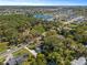 An aerial view of a beautiful neighborhood with lush trees, ponds and nearby community amenities at 430 S Virginia Ave, Sanford, FL 32771