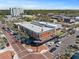 Exterior showcases a classic brick building with retail and residential space at 430 S Virginia Ave, Sanford, FL 32771