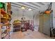 Functional garage space with ample shelving, storage, and workspace for projects at 430 S Virginia Ave, Sanford, FL 32771