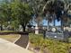 Fort Mellon Park entrance sign with manicured landscaping and walking path at 430 S Virginia Ave, Sanford, FL 32771