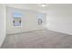 This bright bedroom is spacious and features soft neutral carpet and multiple windows for natural light at 4332 Ranch House Rd, St Cloud, FL 34772