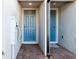 Private entryway featuring brick ground cover and modern door finishes at 4332 Ranch House Rd, St Cloud, FL 34772