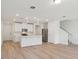 Open concept kitchen with stainless steel appliances and a modern island at 4332 Ranch House Rd, St Cloud, FL 34772