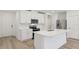 Modern kitchen featuring stainless steel appliances and a central island at 4332 Ranch House Rd, St Cloud, FL 34772