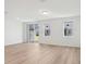 Bright, open living area featuring large windows and modern flooring at 4332 Ranch House Rd, St Cloud, FL 34772
