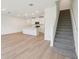 Bright, open-concept living space with recessed lighting and modern flooring at 4332 Ranch House Rd, St Cloud, FL 34772