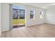 Bright, open living area featuring large sliding doors leading to backyard at 4332 Ranch House Rd, St Cloud, FL 34772