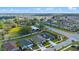 Aerial shot shows community layout, landscaping and nearby amenities at 4475 Casablanca Ave, Kissimmee, FL 34746