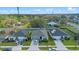 Bird's eye view of homes displays landscaping, driveways, and neighborhood layout at 4475 Casablanca Ave, Kissimmee, FL 34746