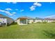 Large backyard offers plenty of space for activities and relaxation at 4475 Casablanca Ave, Kissimmee, FL 34746