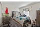 Standard bedroom with basic furnishings and a window allowing natural light into the space at 4475 Casablanca Ave, Kissimmee, FL 34746