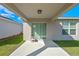 Covered patio with sliding glass doors for seamless indoor-outdoor living at 4475 Casablanca Ave, Kissimmee, FL 34746