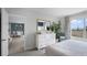 Primary bedroom view leads to a dining space, featuring a white dresser at 487 Taylor Groves Dr, Lake Wales, FL 33898