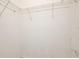 Walk-in closet features white wire shelving for optimal storage space at 604 Coral Trace Blvd, Edgewater, FL 32132
