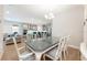 Dining room with access to the kitchen and living room; excellent for entertaining at 706 Hyperion Dr, Debary, FL 32713