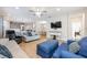 Spacious living room featuring an open floor plan and comfortable seating at 706 Hyperion Dr, Debary, FL 32713