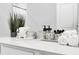 This bathroom features bright counter tops, plenty of space, and unique decor touches at 730 Longboat Dr, Davenport, FL 33896