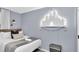 A charming bedroom showcases a decorative Disney castle feature and comfortable furnishings at 730 Longboat Dr, Davenport, FL 33896