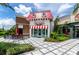 Charming ice cream parlor with a red and white awning, inviting customers for sweet treats and Gathering fun at 730 Longboat Dr, Davenport, FL 33896
