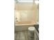 Bathroom features a neutral tub, shower, and a white toilet at 743 Belvoir Dr, Davenport, FL 33837