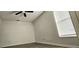 Bedroom features a ceiling fan, vaulted ceilings and a window for natural light at 743 Belvoir Dr, Davenport, FL 33837
