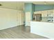 Spacious living area featuring neutral paint, modern flooring and an open concept layout with the kitchen at 743 Belvoir Dr, Davenport, FL 33837