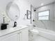 Well-lit bathroom with a tub-shower combo and modern fixtures at 758 Osceola Dr, Sanford, FL 32773