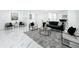 Spacious living room showcasing modern furniture, marble flooring, and open layout perfect for entertaining guests at 758 Osceola Dr, Sanford, FL 32773