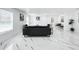Bright living room featuring white marble floors, contemporary decor, and an open-concept design at 758 Osceola Dr, Sanford, FL 32773