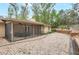 Backyard featuring a screened porch and mature landscaping at 811 Gatehouse Dr, Winter Springs, FL 32708