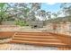 Backyard featuring a raised patio with outdoor furniture at 811 Gatehouse Dr, Winter Springs, FL 32708