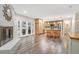 Open concept kitchen with an island, stainless steel appliances, and sliding door to patio at 811 Gatehouse Dr, Winter Springs, FL 32708