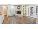 Comfortable living room with a fireplace, built-in shelves, and access to the outdoor patio at 811 Gatehouse Dr, Winter Springs, FL 32708