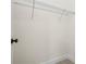 Spacious walk-in closet features wire shelving for efficient storage at 833 S Hancock Dr, Deltona, FL 32725
