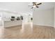 Bright, open-concept living area featuring hardwood floors and abundant natural light at 833 S Hancock Dr, Deltona, FL 32725
