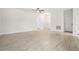 Well-lit living room featuring hardwood floors and neutral colors at 833 S Hancock Dr, Deltona, FL 32725