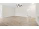Bright and airy living space with hardwood floors and ample room for entertaining at 833 S Hancock Dr, Deltona, FL 32725