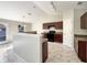 Contemporary kitchen with dark cabinets, modern appliances, and a functional layout, perfect for culinary enthusiasts at 1004 Puget Ln, Kissimmee, FL 34759