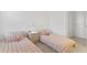 Bedroom featuring two beds, soft carpet and natural light from window at 11356 Sunsail Ave, Orlando, FL 32832
