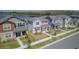 Exterior shot of two story homes with landscaping and sidewalks at 11356 Sunsail Ave, Orlando, FL 32832