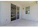 View of the outdoor patio with sliding glass doors to backyard at 11356 Sunsail Ave, Orlando, FL 32832
